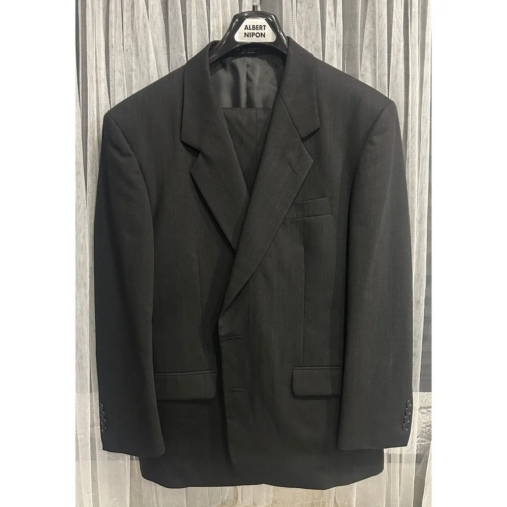 Albert Nipon Double Breasted Suit Charcoal 2 Piece Set. Golden twist, 100% wool.